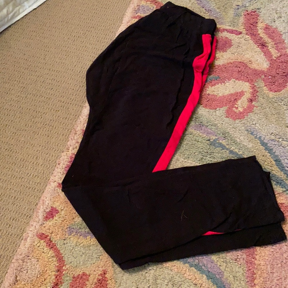 Black joggers with red side
